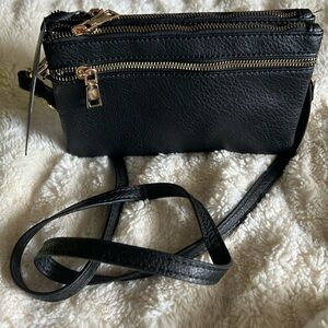DELUXITY small crossbody. Black. NWT. Dual zipper.